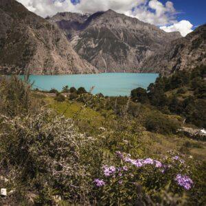 Lower Dolpo Trek turquoise lake with mountain scenery