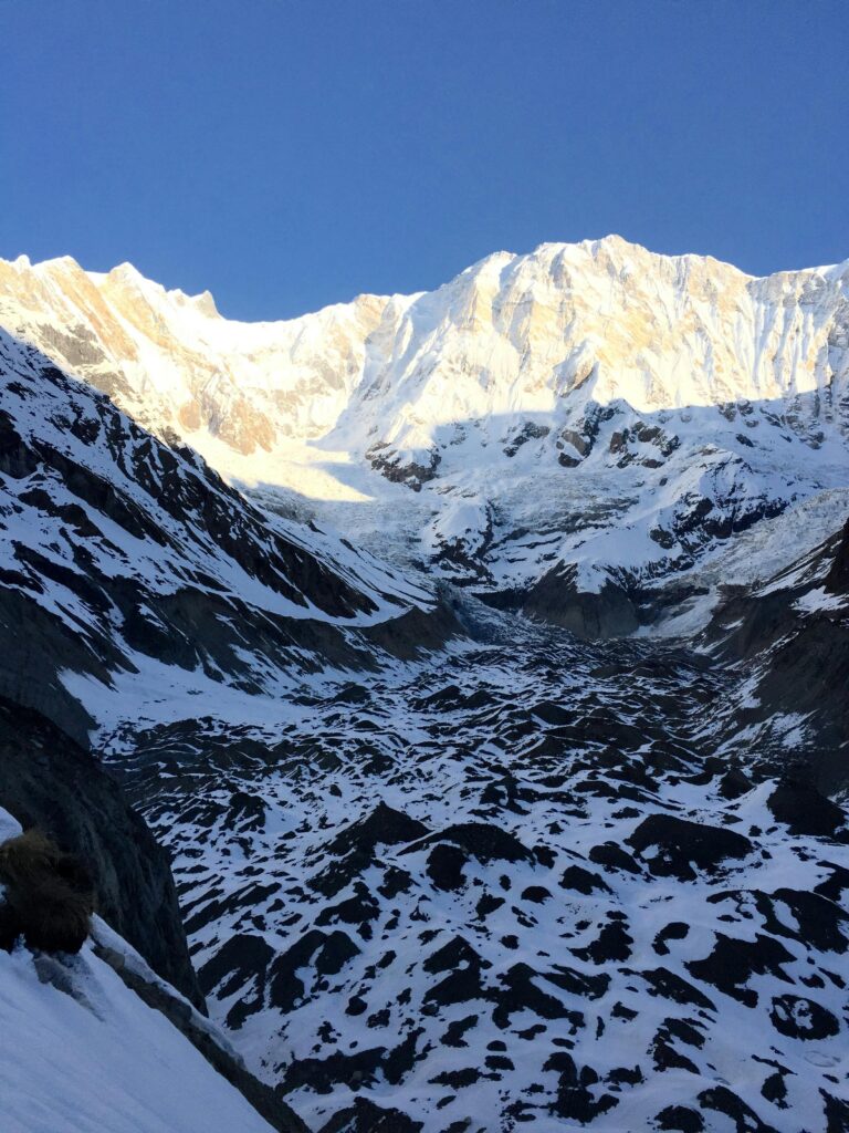 "Annapurna IV (7,525m) towering above the Himalayan landscape in Nepal."