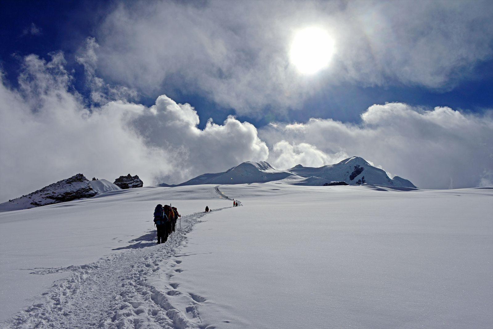 Climbers on the summit of Mera Peak, the highest trekking peak in Nepal, during a Destination Holiday Trek expedition.