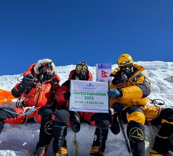Mountaineers celebrating on the summit of Mount Everest during Everest Expedition 2026