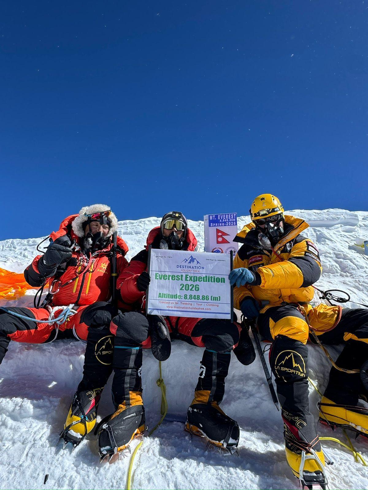 Mountaineers celebrating on the summit of Mount Everest during Everest Expedition 2026